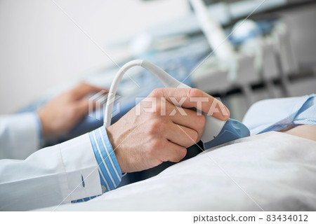 Sonogram procedure at modern hospital 83434012