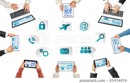 Top view of businesspeople sitting at table and using gadgets 83434059