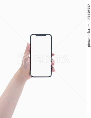 Hand of a woman holding a smartphone 83436532