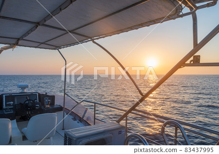 Beautiful orange sunrise over the Genkai Sea Beautiful orange sunrise over the Genkai Sea 83437995