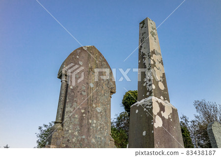 The sun is setting above the Abbey Graveyard which was build by Hugh O Donnell in 1474 - all names and artwork removed The sun is setting above the Abbey Graveyard which was build by Hugh O Donnell in 1474 - all names and artwork removed 83438187