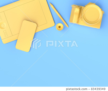 Top view of designer workspace and photography gear on blue table background Top view of designer workspace and photography gear on blue table background 83439349