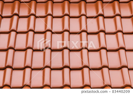 Shiny red new roof tiling, background photo Shiny red new roof tiling, background photo 83440209