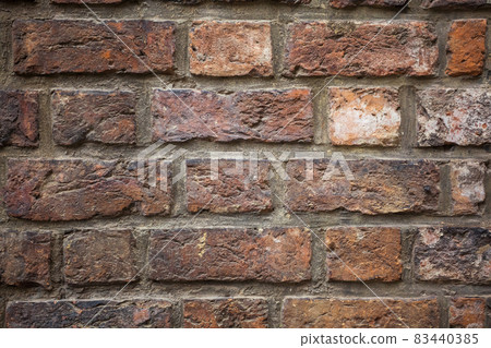 old red brick wall texture background. old red brick wall texture background. 83440385
