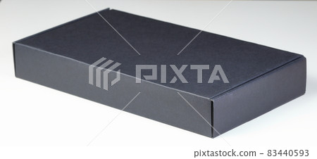 Black Square Cardboard box for Parcel Delivery isolated on white background Black Square Cardboard box for Parcel Delivery isolated on white background 83440593