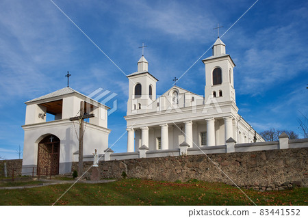 Old ancient church of the Holy Guardian Angels and bell tower in Rogotno, Lida district, Grodno region, Belarus. 83441552