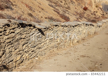 stone fence in the himalayas 83442211