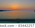 Kouri Island and Kouri Ohashi (northern part of the main island of Okinawa) dyed in the setting sun 83442257