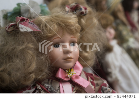Portrait of vintage dolls at flea market in the street Portrait of vintage dolls at flea market in the street 83444071