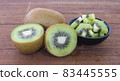 kiwi fruit isolated on wood background 83445555