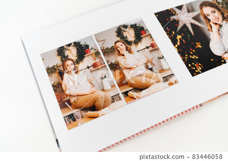 pages of photobook from photo shoot pregnancy on New Year's Day 83446058