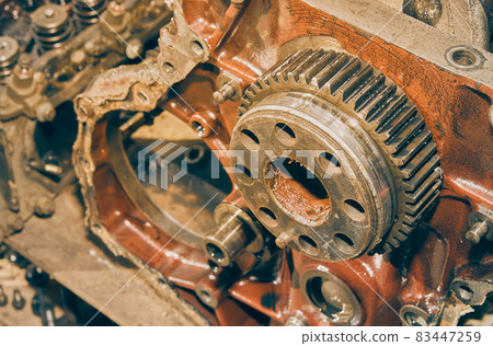 Right Frame High Angle View of Crankshaft Gear in Front of Engine in Vintage Tone Right Frame High Angle View of Crankshaft Gear in Front of Engine in Vintage Tone 83447259