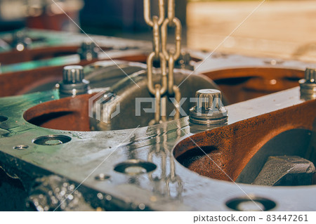 Right Frame Cylinder Block Bolt and Engine Oil Stain in Vintage Tone 83447261