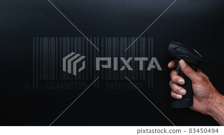 Barcode scanning. Reader laser scanner for warehouse. Retail label barcode scan on dark background. Warehouse inventory management. Barcode scanning. Reader laser scanner for warehouse. Retail label barcode scan on dark background. Warehouse inventory management. 83450494