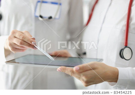 Nurse and doctor in medical gowns Nurse and doctor in medical gowns 83454225