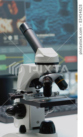 Close up of chemical microscope and medical research equipment Close up of chemical microscope and medical research equipment 83454828