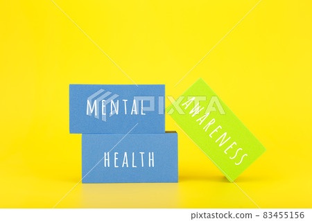 Mental health awareness minimal colorful concept on yellow background. Stack of rectangles with text 83455156