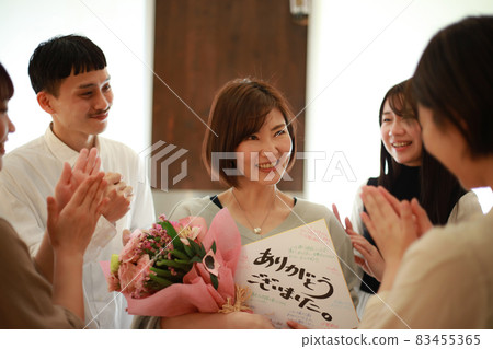 A woman who receives a gift due to a transfer of work 83455365