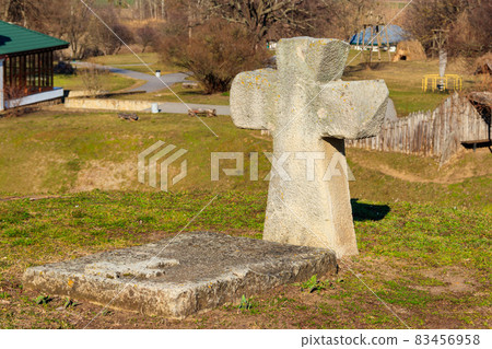 Ancient gravestone crosses (17th - 18th century) at the famous historic St. Elijah Church in Subotiv village, Ukraine Ancient gravestone crosses (17th - 18th century) at the famous historic St. Elijah Church in Subotiv village, Ukraine 83456958