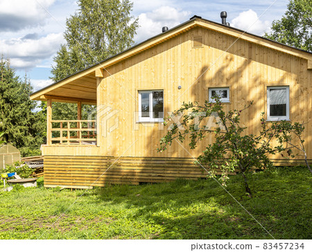 Rural wooden house in russian village Rural wooden house in russian village 83457234