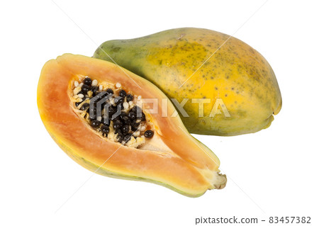 Raw organic papaya fruit sliced in half which have many antioxidant food nutrition health benefits on a white background Raw organic papaya fruit sliced in half which have many antioxidant food nutrition health benefits on a white background 83457382