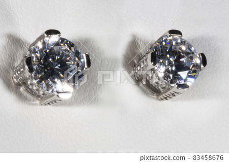 earrings made of white gold with zircon. Cheap substitute for a diamond 83458676