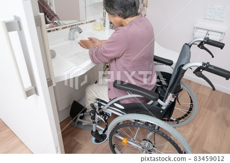 Washbasin where you can wash your hands in a wheelchair Washbasin where you can wash your hands in a wheelchair 83459012