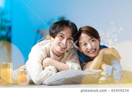 Middle couple lifestyle lie down 83459234