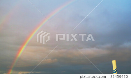 Scenery with a rainbow over the sky after the rain (Kawaguchi City, Saitama Prefecture) 83459450