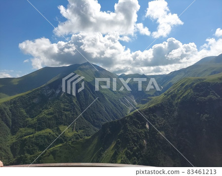 green mountains in the clouds 83461213