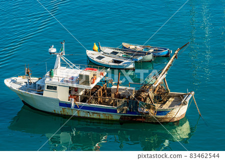 Old Fishing Trawler Moored in the Port of Lerici - Gulf of La Spezia Italy Old Fishing Trawler Moored in the Port of Lerici - Gulf of La Spezia Italy 83462544