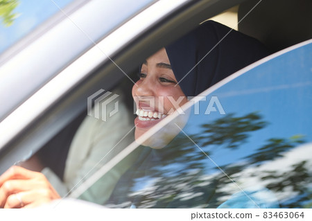 Arabic Woman Traveling By Car Arabic Woman Traveling By Car 83463064