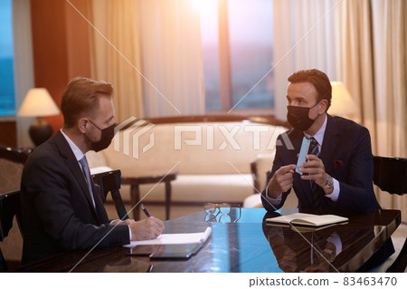 business people wearing crona virus protection face mask on meeting 83463470