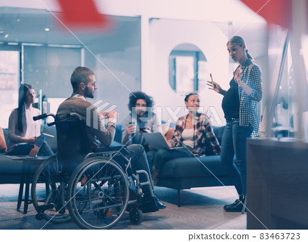 Pregnant Businesswoman Leads Creative Meeting Of Business Team In Modern Coworking open Space Office Pregnant Businesswoman Leads Creative Meeting Of Business Team In Modern Coworking open Space Office 83463723