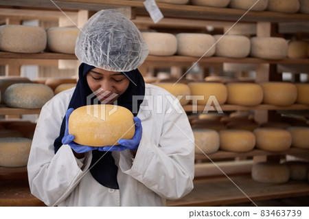 African black muslim business woman in local cheese production company African black muslim business woman in local cheese production company 83463739