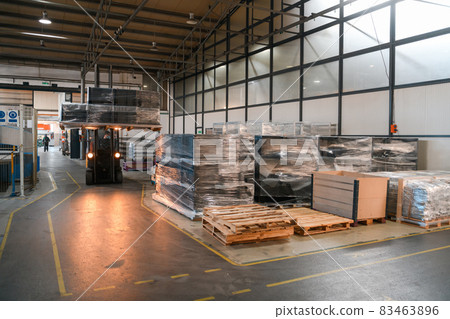 Forklift loader in storage warehouse ship yard. Distribution products. Delivery. Logistics. Transportation. Business background 83463896