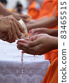 This is rite sprinkle water onto a monk , Buddha image on Songkran festival Thailand 83465515