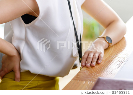 Suffering from back pain 83465551