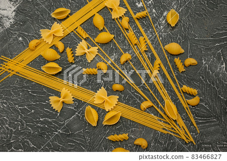 top view Various types of Italian pasta on wooden background top view Various types of Italian pasta on wooden background 83466827