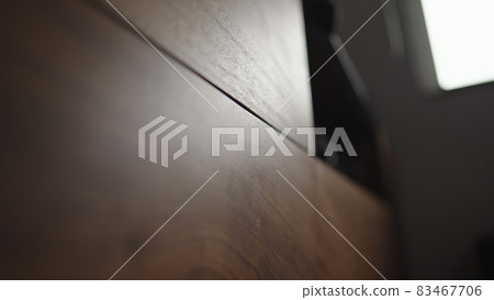 low angle shot of black walnut under tv cabinet 83467706