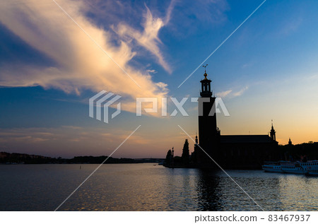 Stockholm City Hall Stadshuset tower at sunset, dusk, Sweden 83467937