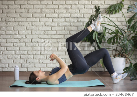 woman working out at home. woman working out at home. 83468467