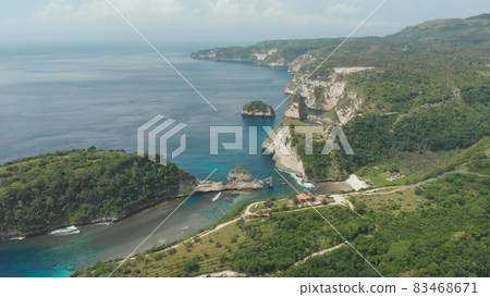 Aerial view of the small island of Nusa Penida Island from the Atuh Rija Lima shrine on Nusa Penida Island near Bali, Indonesia. Nusa Penida island aerial view beach from drone. 83468671
