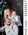 happy family on Christmas background 83468817