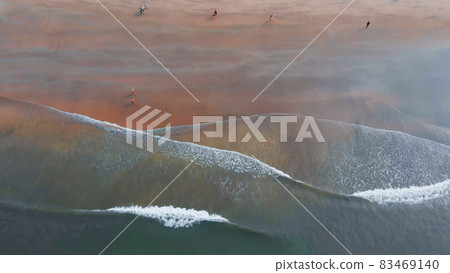 Shooting from the drone of the Arambol beach with tidal waves. Goa State. India. 83469140