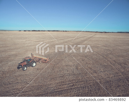 Tractor and seeder, direct sowing in the pampa, Argentina 83469892