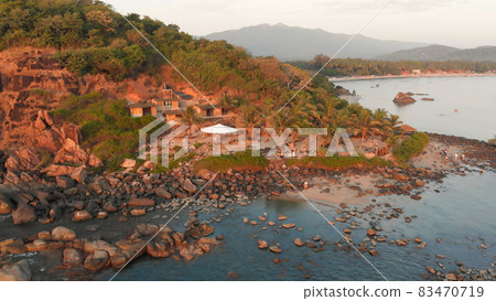 Rocky beach near Palolem beach at sunset. Goa State. India. 83470719
