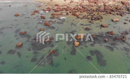 Stony Kalacha beach in Goa. India. Flight of the drone. 83470721