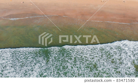 Aerial drone view of deserted Arambol beach on Goa with waves. India. Aerial drone view of deserted Arambol beach on Goa with waves. India. 83471580