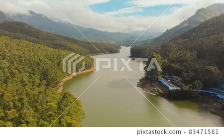 Aerial view beautiful nature with mountains and hills by Lake Mattupetty. Kerala State. Near the city of Munar. 83471581